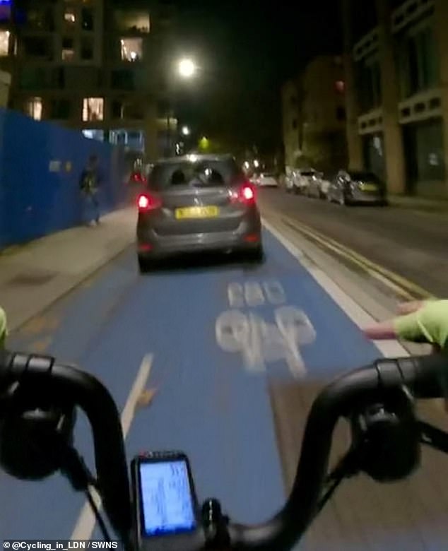 1669043304_858_Moment-car-drives-along-busy-two-way-cycle-lane-during-rush.jpg