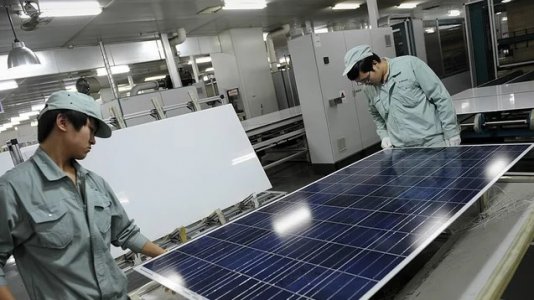 chinese dudes inspect solar panel.jpg